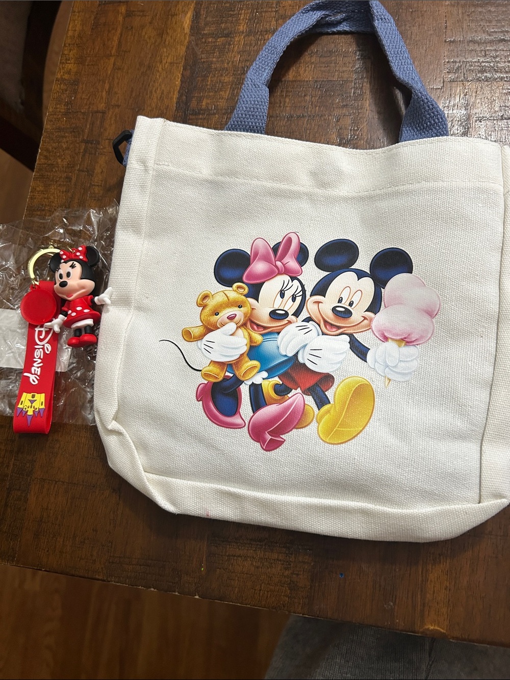 Disney Cream Canvas Tote with Colorful Mickey & Minnie Graphic and Blue Handles
